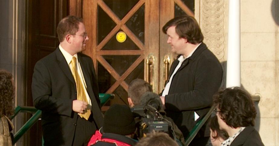 Jim Jepps and others, BBC TV at the entrance to Shire Hall during a demonstration against County Council arms investments, Cambridge, 13 Dec 2005