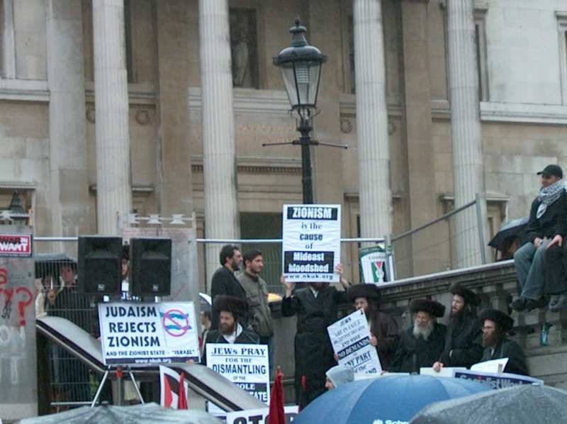 Palestine demonstration, London, 20 May 2006 - placards in Trafalgar Square, one reading 'JUDAISM REJECTS ZIONISM'.